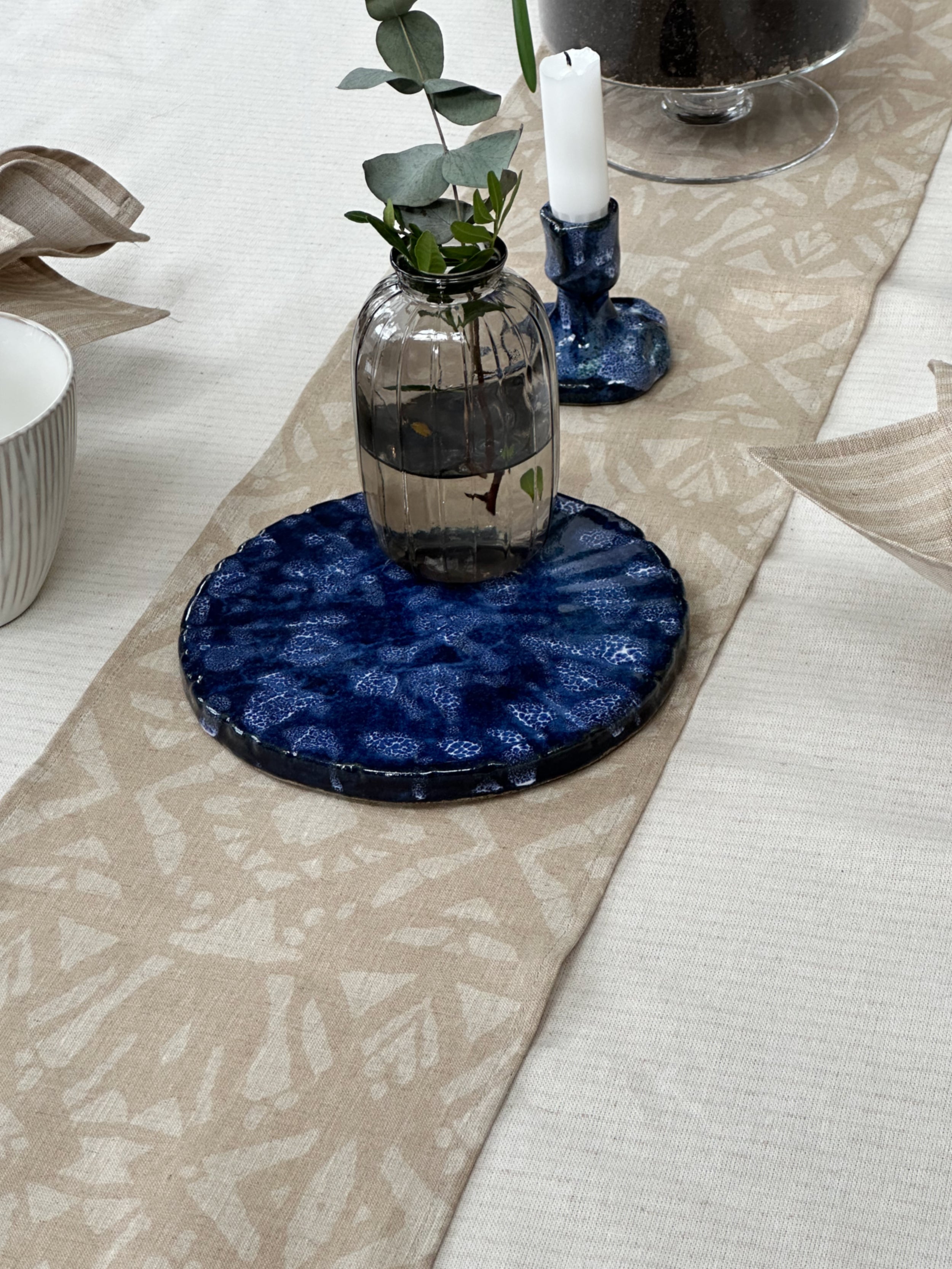 Festremsa Linblomma, Glimma