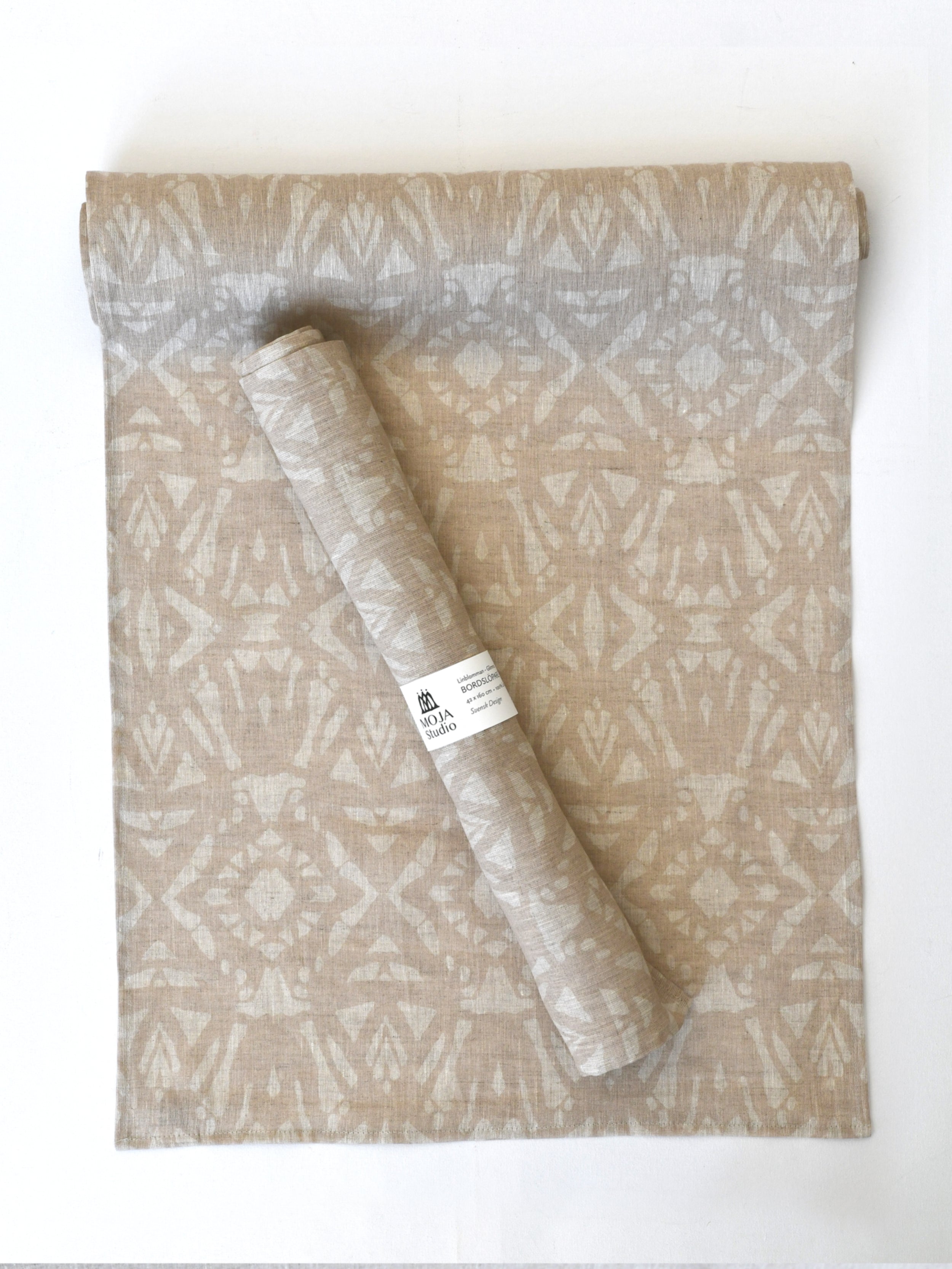 Bordslöpare Linblomma, Glimma